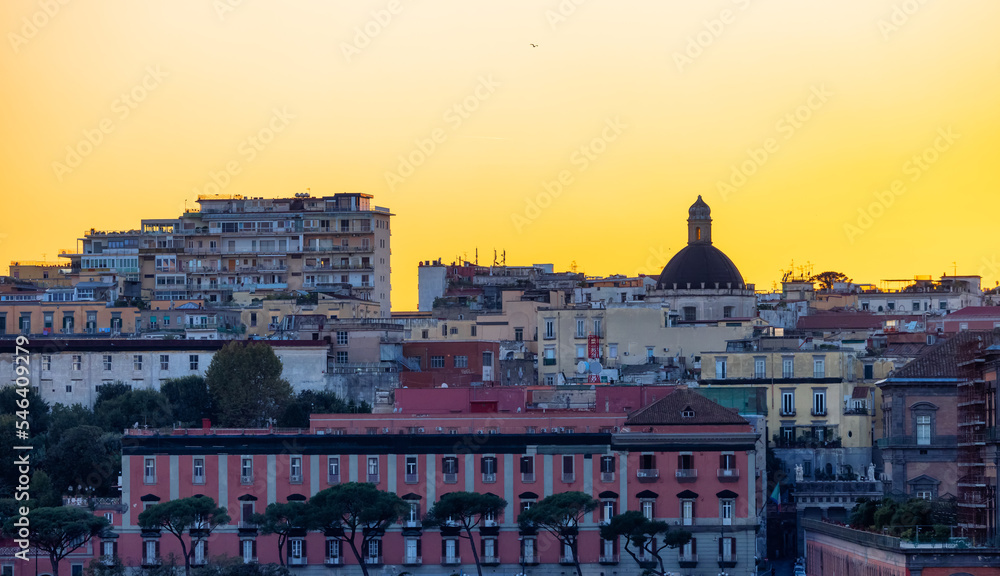 Residential Apartment Home Buildings in Historic Downtown City on Mediterranean Coast of Naples, Italy. Sunset Sky.