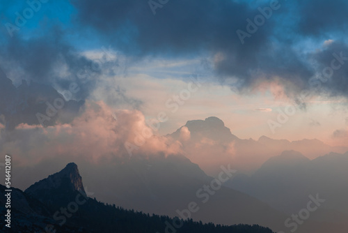 sunrise behind clouds