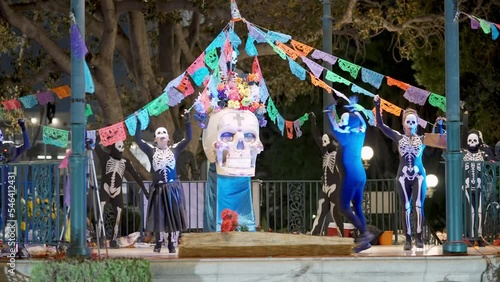 Festivity performance for the day of the death at the plaza at night, dia de los muertos 