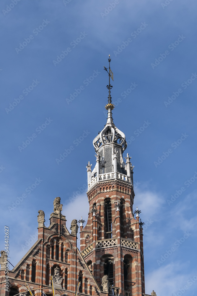 Architectural detail of Magna Plaza Shopping Center buiding. Magna Plaza, formerly known as Amsterdam Main Post Office, is a monument part of Dutch Top 100 heritage sites. AMSTERDAM, The NETHERLANDS. Architectural detail of Magna Plaza Shopping Center buiding. Magna Plaza, formerly known as Amsterdam Main Post Office, is a monument part of Dutch Top 100 heritage sites. AMSTERDAM, The NETHERLANDS.
