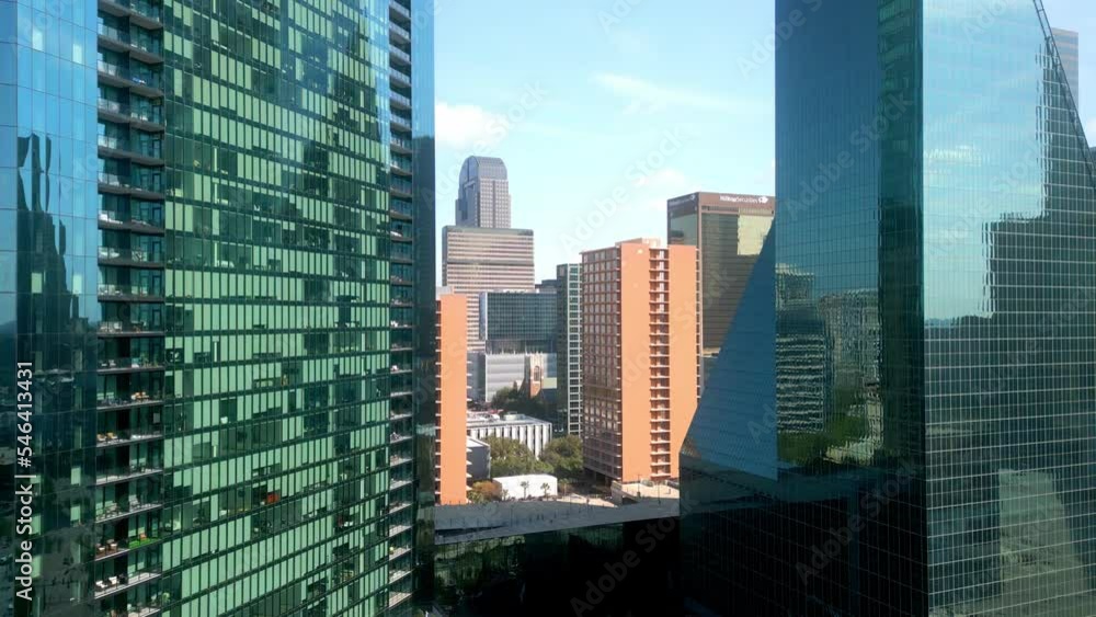 The iconic skyscrapers and office buildings in the city center of Dallas - aerial view The iconic skyscrapers and office buildings in the city center of Dallas - aerial view