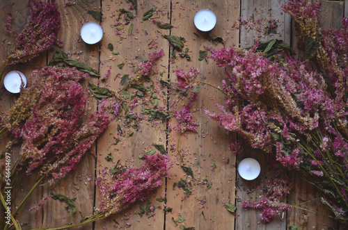 Dead Celosia Flowers with Candles on a Rustic Wood Background | Romantic Dead Flowers | Candles with Flowers