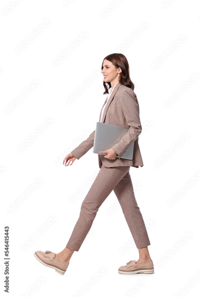Happy young businesswoman with laptop walking on white background Happy young businesswoman with laptop walking on white background