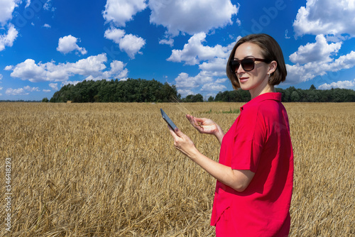 Woman in wheat field. Girl ...