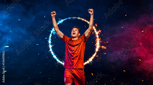 Socccer concept. Sports betting on football. Design for a bookmaker. Download banner for sports website. Soccer player winner on a fiery background