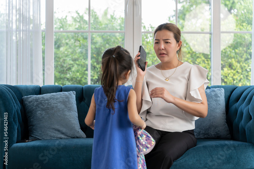 Lovely daughter distracted mother from conversation