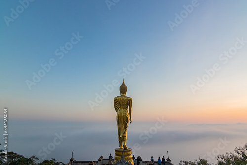 Buddha standing on a mountain Wat Phra That Khao Noi, Nan Province, Thailand