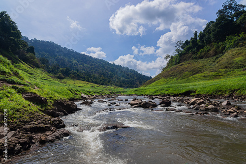 Khao Chong Lom Waterfall in the fresh green mountain. At Khun Dan Prakarnchon Dam, Nakhon Nayok Province, Thailand. photo