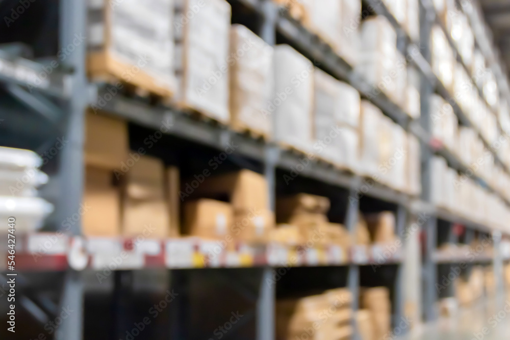 Blurred industrial warehouse or storage factory space and hardware box for delivery with logistics concept for business. Blurred industrial warehouse or storage factory space and hardware box for delivery with logistics concept for business.