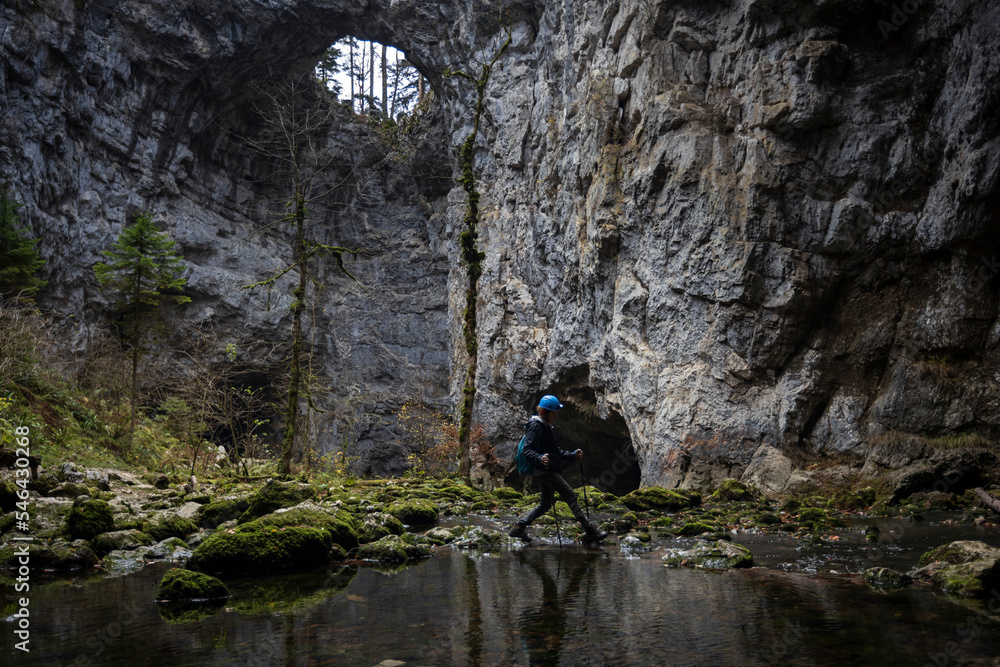 Tourist on Speleology Adventure Discovery Vacation in Slovenia Europe