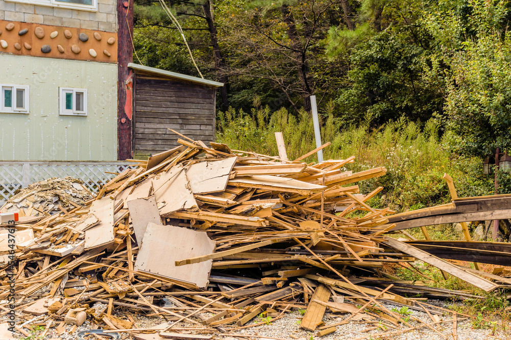 Pile of used broken lumber and sheetrock