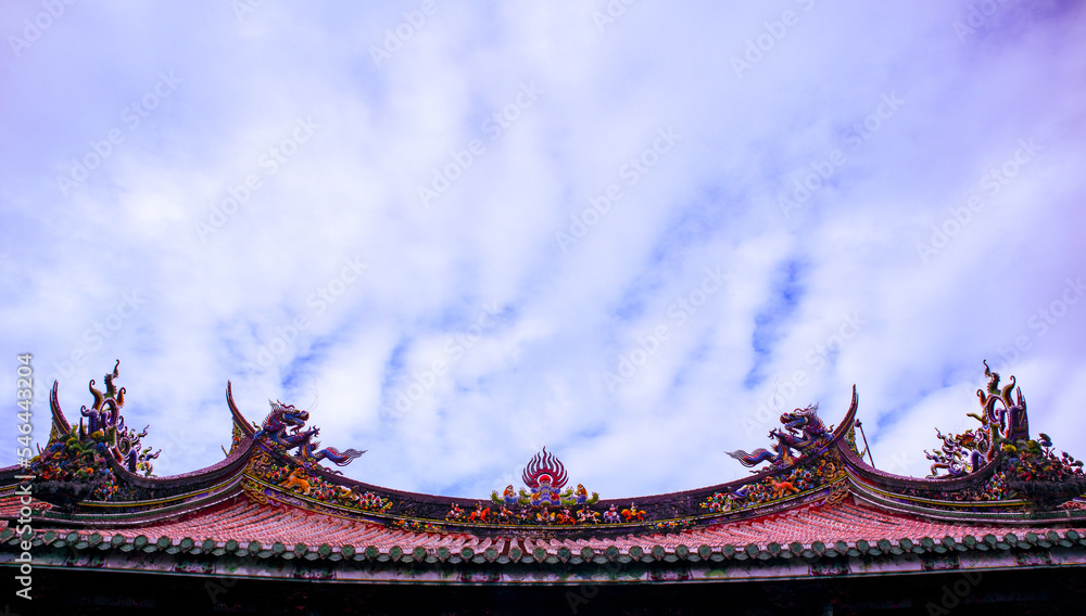 a dragon sculture of temple roof