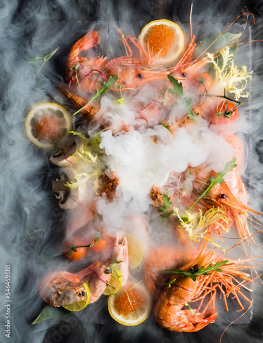 shrimps on stone plate with smoke