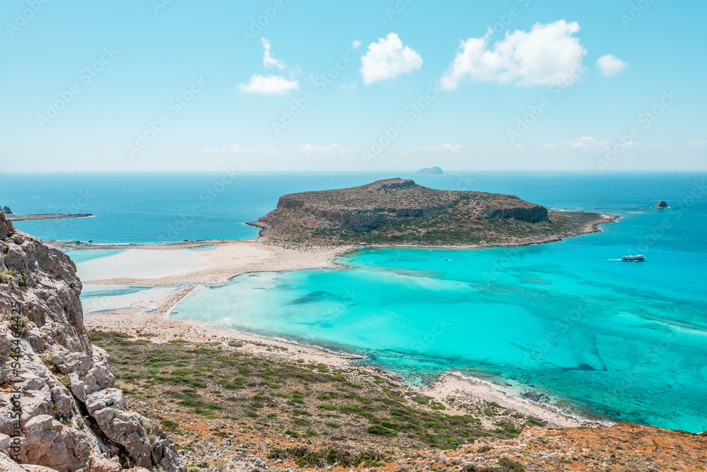 Balos lagoon, crete island, greece: view to tagani island with white sandy beach and turquoise blue water at the main tourist destination near chania