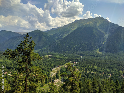 Beautiful view of the landscape of the Caucasus Mountains and the coniferous forest in the village of Arkhyz. Nature concept. Arkhyz, Karachay-Cherkessia, Russia