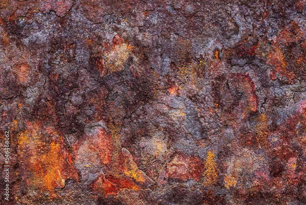 Colored rusty surface with an abstract pattern