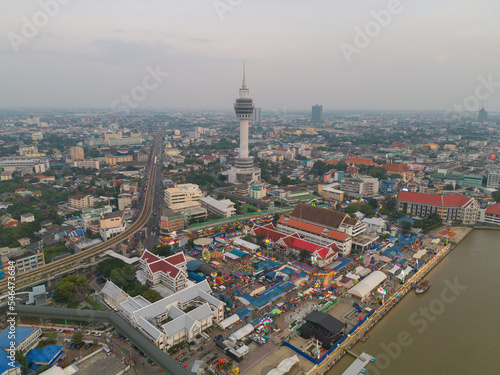 Aerial top view of observation deck viewpoints tower  Samut Prakan urban city town skyline view. Sightseeing exploring city skyline in travel on holiday vacation. Thailand.