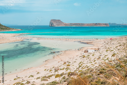 Obraz na płótnie Balos lagoon, crete island, greece: view to gramvoussa island with white sandy beach and turquoise blue water at the main tourist destination near chania w salonie