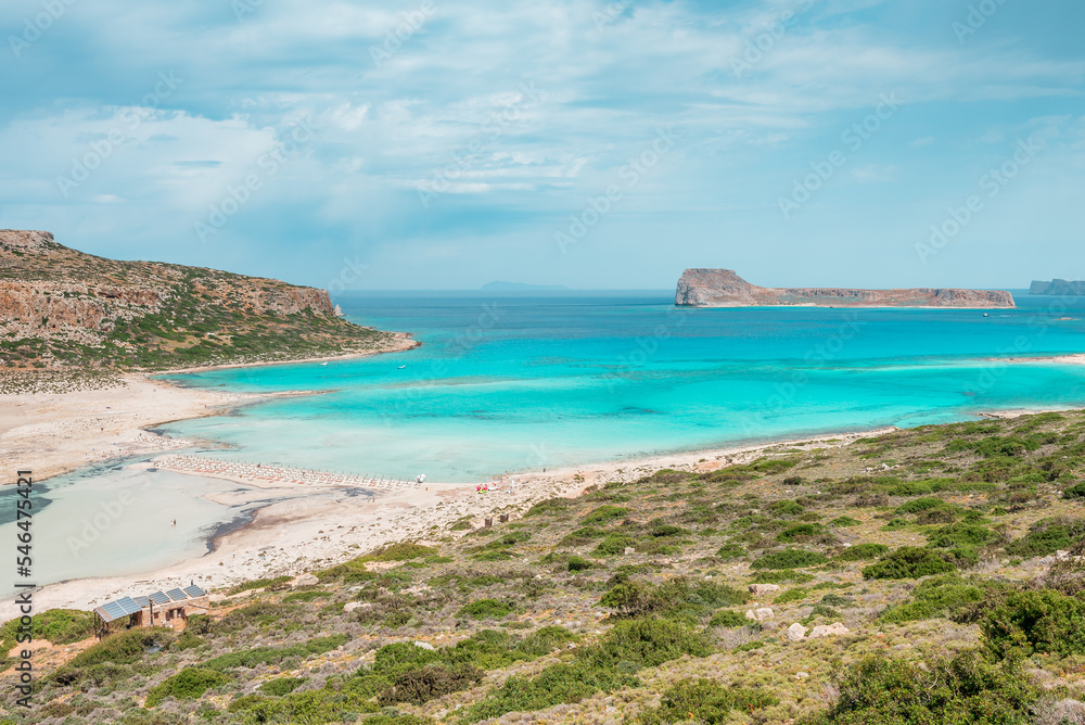 Balos lagoon, crete island, greece: view to gramvoussa island with white sandy beach and turquoise blue water at the main tourist destination near chania