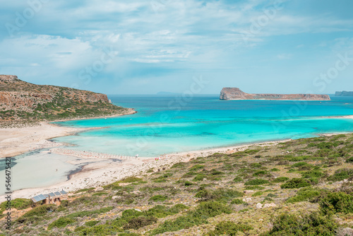 Obraz na płótnie Balos lagoon, crete island, greece: view to gramvoussa island with white sandy beach and turquoise blue water at the main tourist destination near chania w salonie