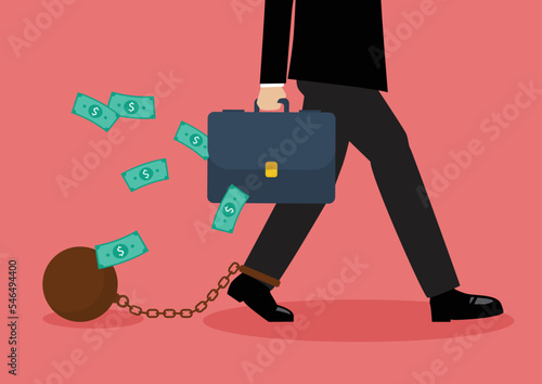 Chained businessman holding money bag