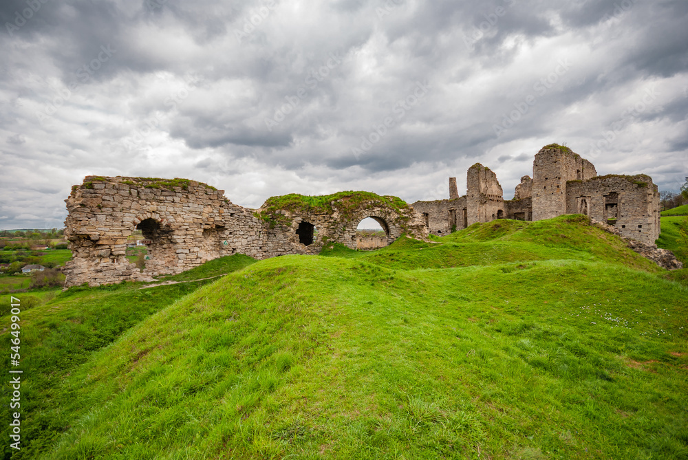 Ruins of the Skala-Podilsky castle against a cloudy sky in the Ternopil region