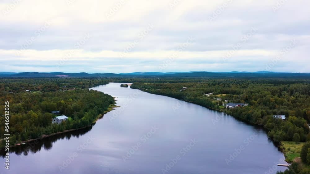 Beautiful landscape of Inari Lake and village surrounded by mountains, Aerial shot Beautiful landscape of Inari Lake and village surrounded by mountains, Aerial shot