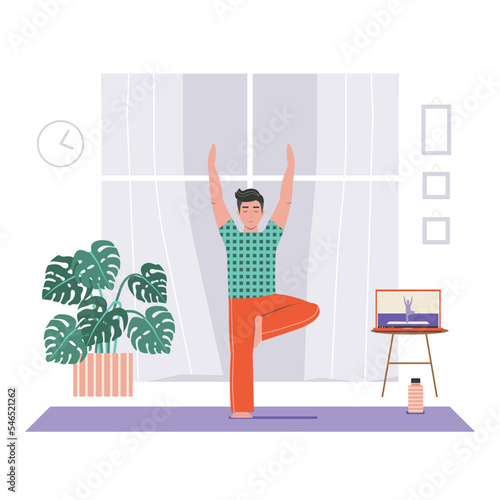 Young Man Practicing Yoga Online Using Laptop