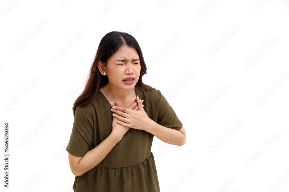 Beautiful asian woman suffering from chest pain, heart attack. Isolated on white background with copyspace Beautiful asian woman suffering from chest pain, heart attack. Isolated on white background with copyspace