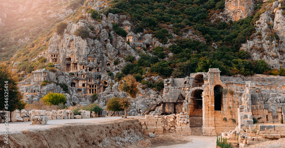 Naklejka premium Banner ruins Myra Ancient City in Demre to Antalya, archaeology landmarks of Turkey sunset light