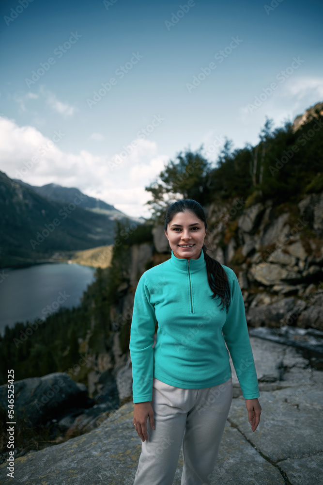 Naklejka premium Sporty brunette woman on the mountain national park.
