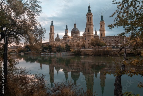 Autumn photography at sunset from the Basilica of Our Lady of the Pilar in Zaragoza  next to the Ebro river and the Stone Bridge  Aragon  Spain. 