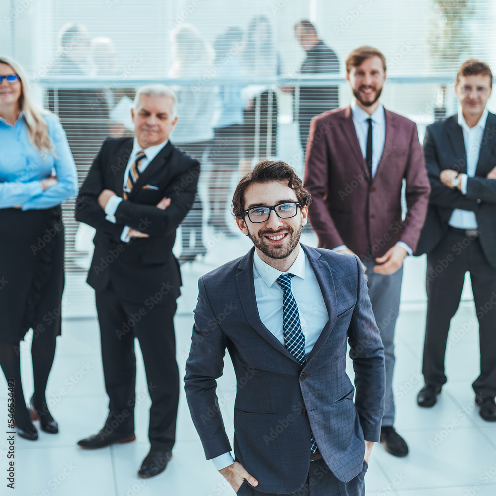 group of successful business people standing in the office group of successful business people standing in the office