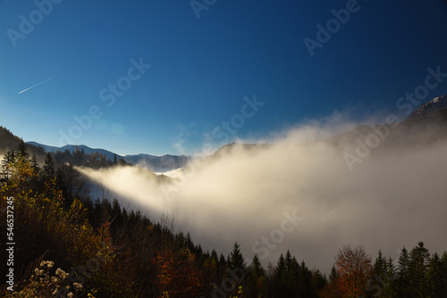 Salzachtal Pongau Salzburg gefüllt mit Nebel mit Fritztaler Berge im Hintergrund unter blau Himmel im Herbst, Salzach valley filled with fog mountain and blue sky in fall in background