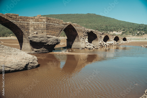 Roman bridge of Vinuesa in the province of Soria, Spain photo