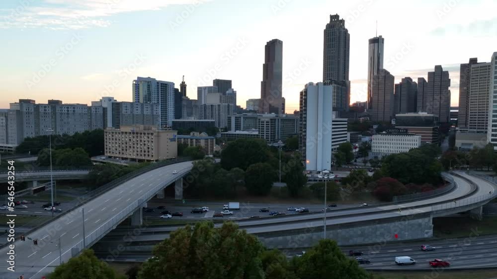 Downtown Atlanta traffic on interstate highway freeways. Aerial at golden hour. Downtown Atlanta traffic on interstate highway freeways. Aerial at golden hour.