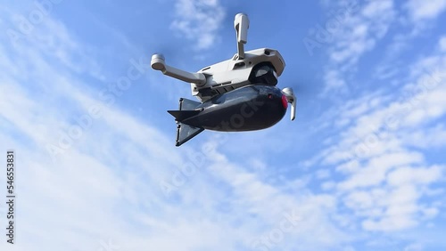 consumer civilian drone with a big bomb on board flies in the blue sky