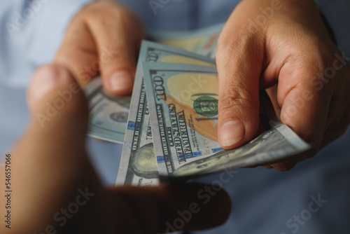 dollar money businessman catching cash .Business finance dollar concept close up of hands counting paper dollars exchange finance economy dollars lifestyle usd.