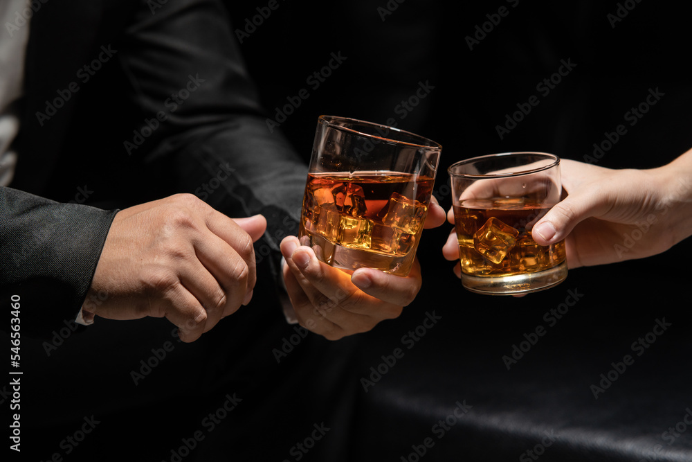 Businessmen in suits drinking  Celebrate whiskey