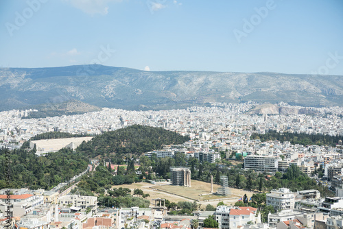 Athens, Greece. Acropolis and Parthenon temple, landmark. Ancient remains scenic view from Lycabettus Hill. Urban cityscape, blue sea and sky background © Maria