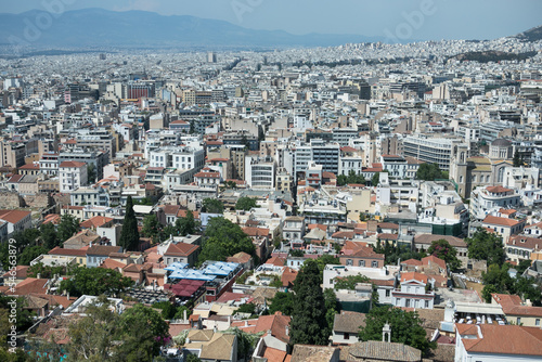 Athens, Greece. Acropolis and Parthenon temple, landmark. Ancient remains scenic view from Lycabettus Hill. Urban cityscape, blue sea and sky background