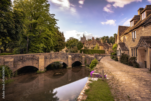 Castle Combe - May 28 2022: Old Cotswolds town of Castle Combe, England.