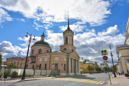 Iverskaya Church against the blue sky in Moscow on Bolshaya Ordynka street photo