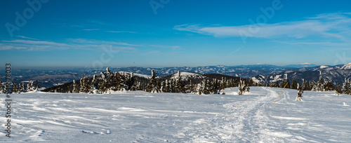 Beskids mountains with highest Babia hora hill from Zazriva hill in winter Mala Fatra mountains in Slovakia photo