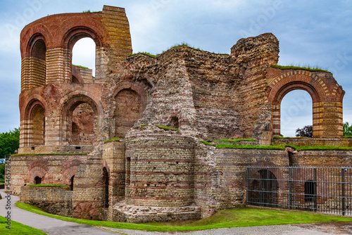 Nice view from the north of the entrance area of the Kaiserthermen (Imperial Baths), a large Roman bath complex in Trier, Germany. The central apse is on the left, in the middle is a stair tower ruin. photo