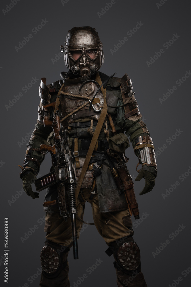 Portrait of military survivor in post apocalypse dressed in armored costume.