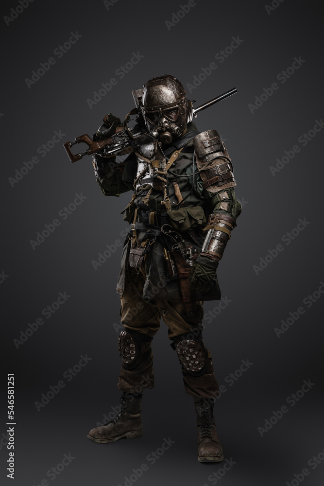 Portrait of isolated on grey stalker surviving in post apocalypse. Portrait of isolated on grey stalker surviving in post apocalypse.