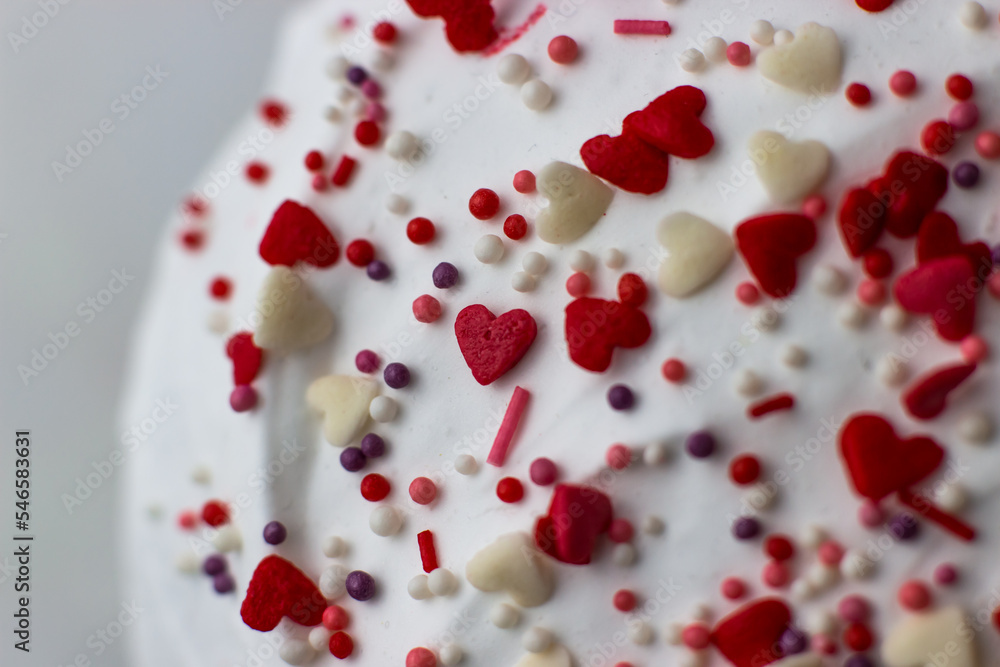 Easter decorated with white sugar glaze, red and white sugar hearts Easter decorated with white sugar glaze, red and white sugar hearts