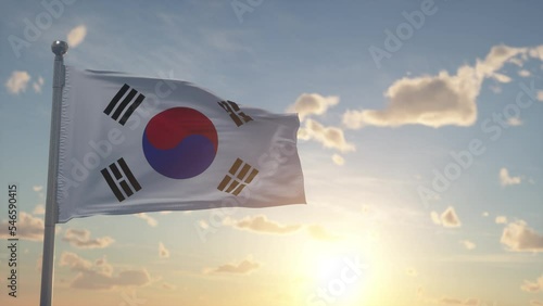 South Korea flag on pole waving in the wind sky background. The national flag of South Korea photo