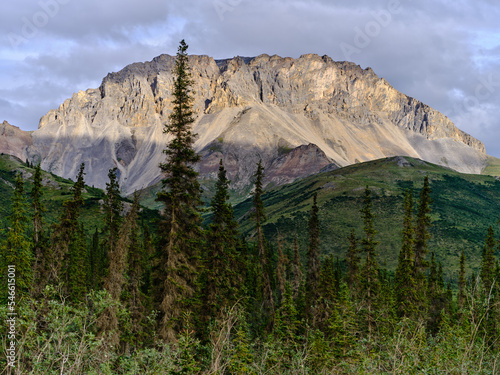 Rugged Mountain Peaks rise out of the Alaska Landscape near Gates of the Arctic national Park near the coldfoot Camp on the Dalton Highway photo